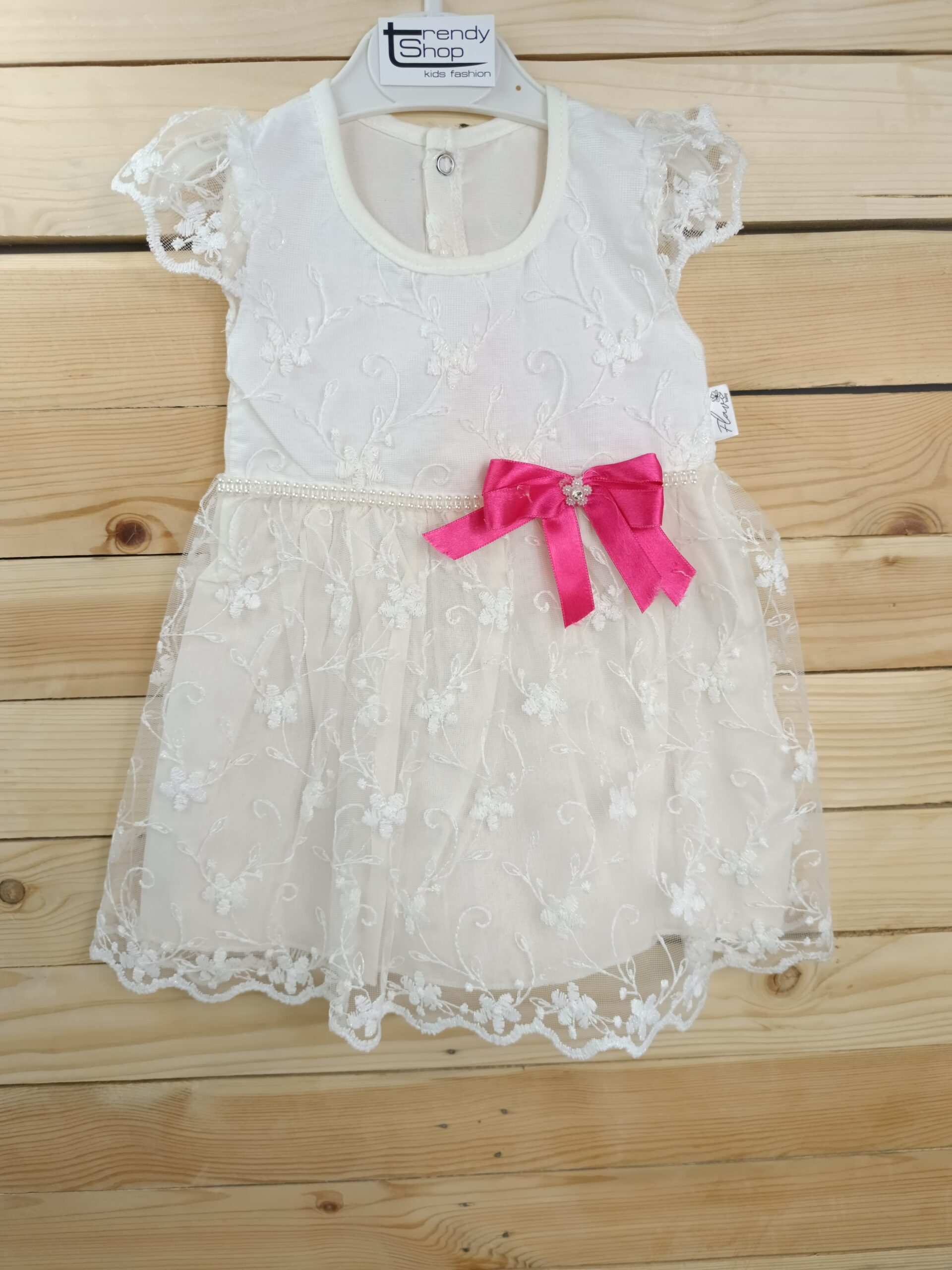 Δαντελένιο φόρεμα με φούξια φιόγκο (6-18 μηνών)